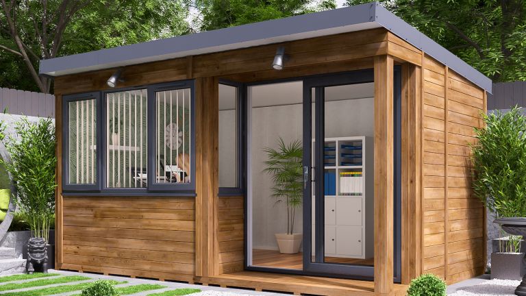 mainly wood backyard studio with windows and sliding doors