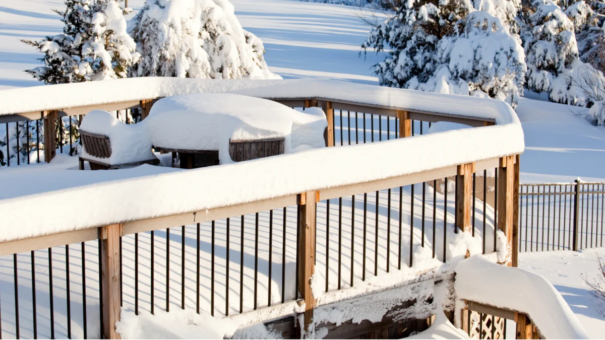 winter deck snow covered railing