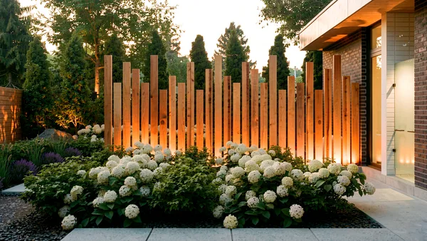Waymar landscape design render &mdash; Accent privacy wall glowing at golden hour behind the hydrangea bed