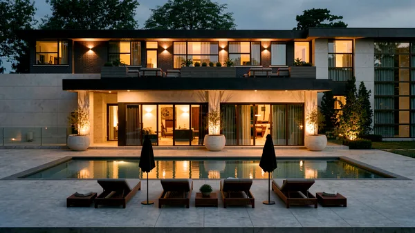 Waymar landscape design render &mdash; House and pool at night with loungers and lit umbrellas