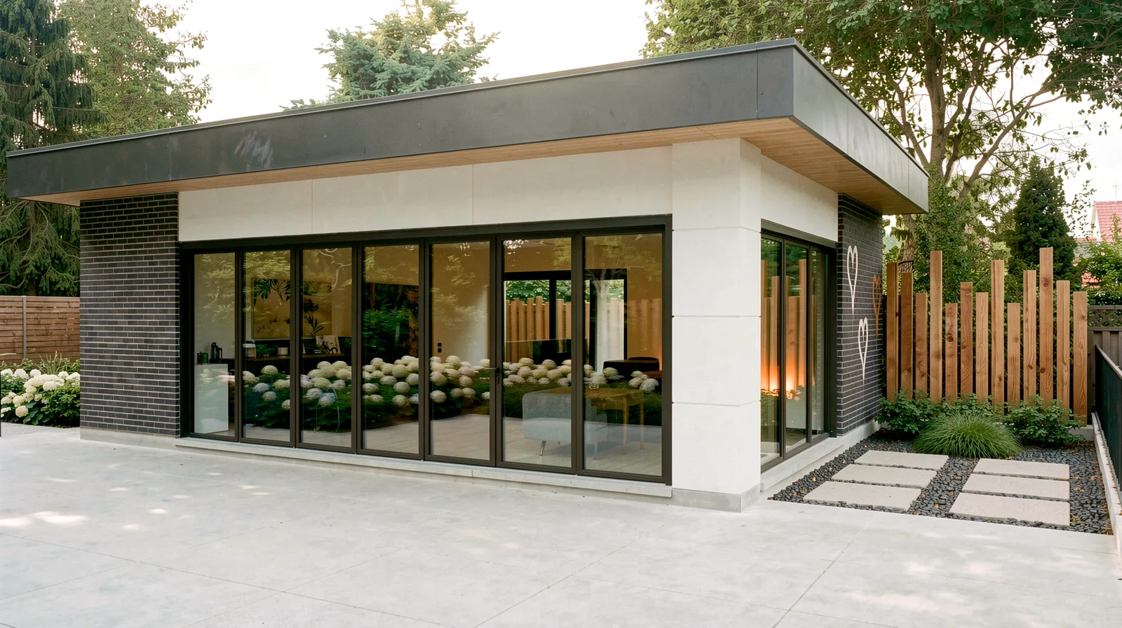 Waymar landscape design render &mdash; Cabana in a brick and wood palette with folding glass doors onto the stone patio